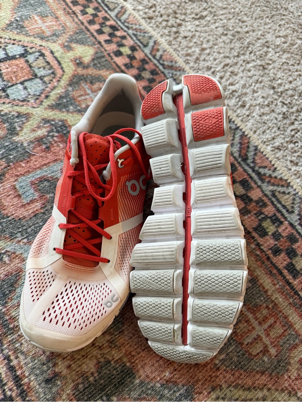 On Running Women's Red and White Athletic Shoes